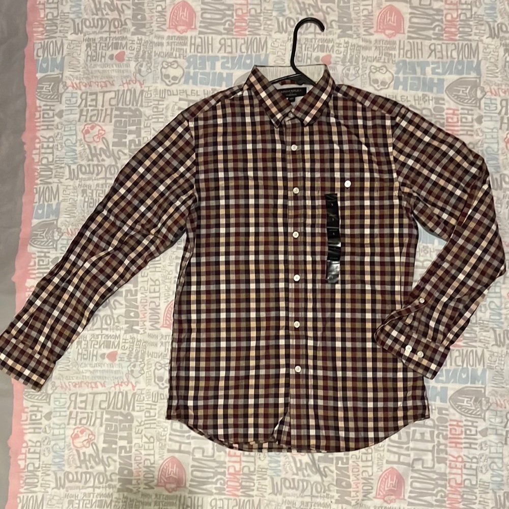 Long sleeve button shirt. Casual or party.